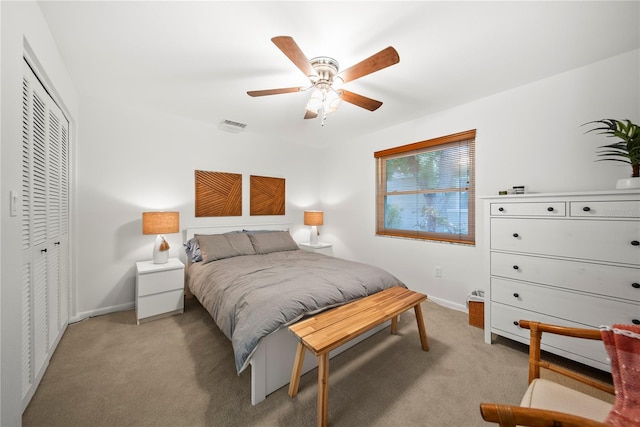 1810 Pine Hill Dr, Safety Harbor, FL 34695 - bedroom featuring light colored carpet, a closet, baseboards, and ceiling fan