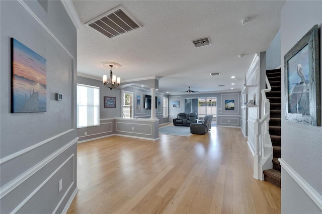 2510 Cross More St, Valrico, FL 33594 - interior space featuring ornate columns, ornamental molding, visible vents, and stairway