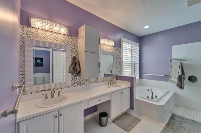 2510 Cross More St, Valrico, FL 33594 - full bath featuring a sink, double vanity, a bath, and visible vents