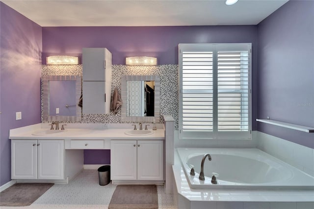 2510 Cross More St, Valrico, FL 33594 - full bathroom with a sink, plenty of natural light, double vanity, and a bath
