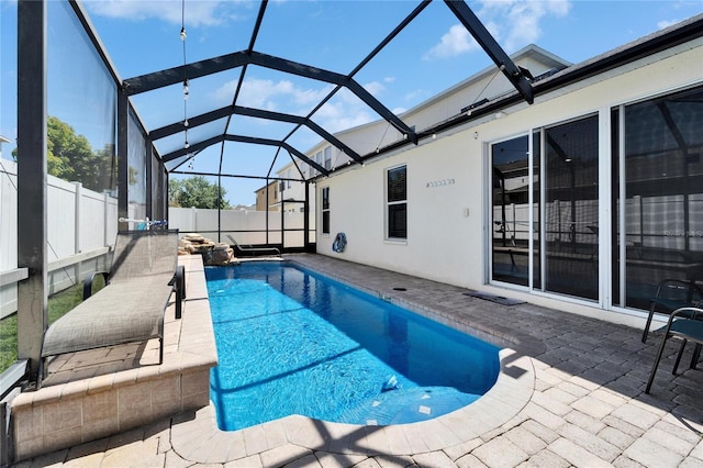2510 Cross More St, Valrico, FL 33594 - view of pool with a fenced in pool, fence, glass enclosure, and a patio area