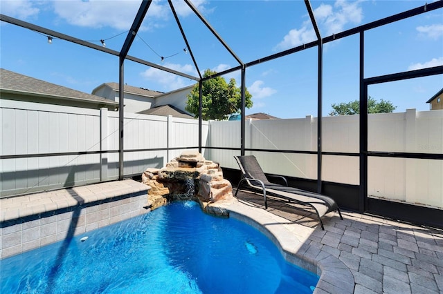 2510 Cross More St, Valrico, FL 33594 - view of pool featuring a fenced in pool, a lanai, a fenced backyard, and a patio area