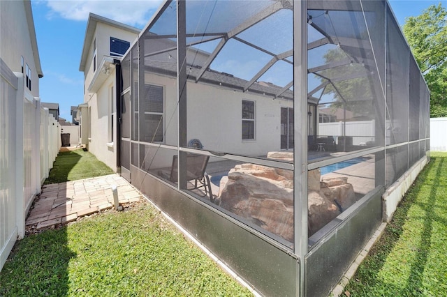 2510 Cross More St, Valrico, FL 33594 - rear view of house featuring a patio, a fenced backyard, stucco siding, a fenced in pool, and glass enclosure
