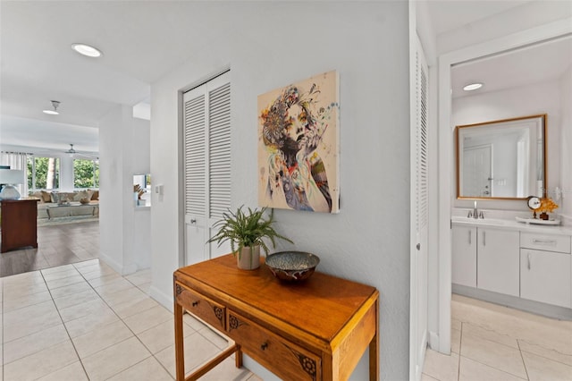 4750 Dolphin Cay Ln S Unit 209, Saint Petersburg, FL 33711 - hall with light tile patterned flooring and recessed lighting