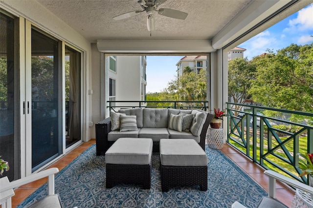 4750 Dolphin Cay Ln S Unit 209, Saint Petersburg, FL 33711 - sunroom / solarium with a ceiling fan, plenty of natural light, and outdoor lounge area