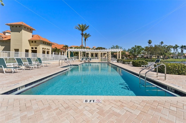 4750 Dolphin Cay Ln S Unit 209, Saint Petersburg, FL 33711 - community pool with a pergola and a patio