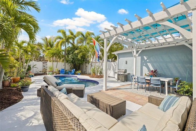 view of swimming pool with area for grilling, a patio, a pergola, and outdoor lounge area
