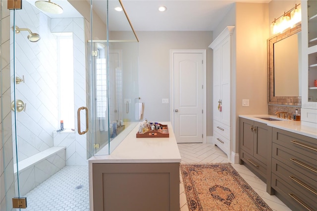 11105 5th St E, Treasure Island, FL 33706 - bathroom featuring a shower stall, tasteful backsplash, vanity, and recessed lighting