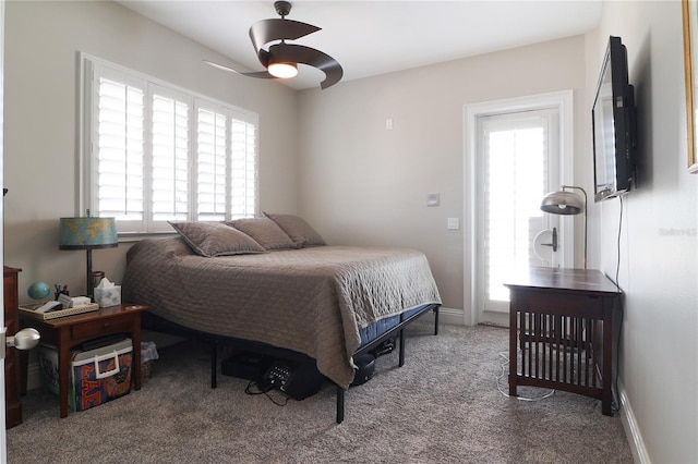 11105 5th St E, Treasure Island, FL 33706 - carpeted bedroom featuring ceiling fan