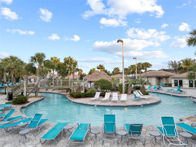 1568 Maidstone Ct, Davenport, FL 33896 - community pool with a patio area