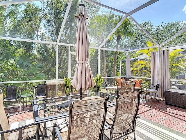 unfurnished sunroom with outdoor dining space