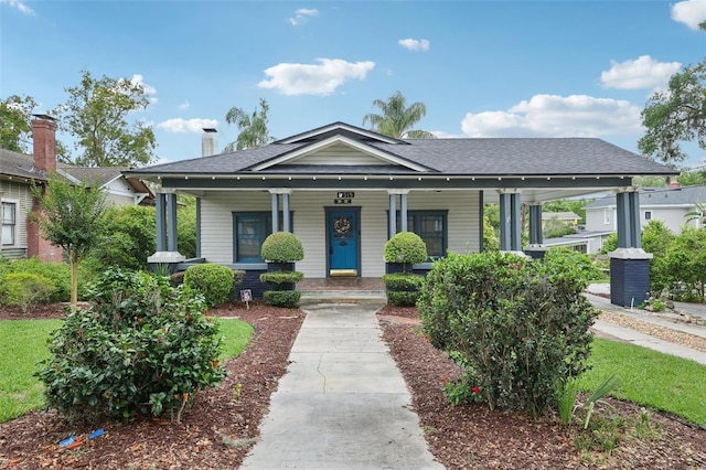 515 Frank Lloyd Wright Way, Lakeland, FL 33803 - bungalow with a porch and roof with shingles