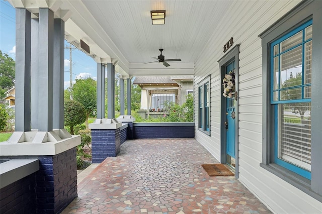 515 Frank Lloyd Wright Way, Lakeland, FL 33803 - covered porch featuring ceiling fan