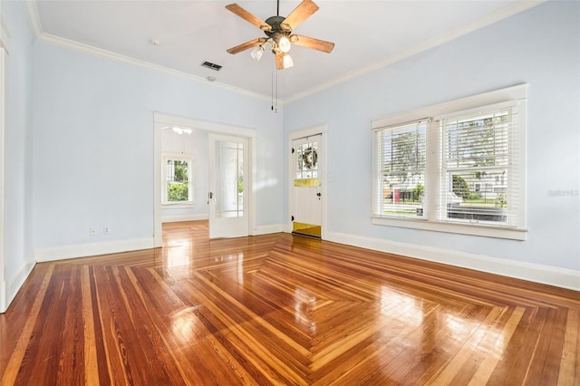 515 Frank Lloyd Wright Way, Lakeland, FL 33803 - spare room featuring ornamental molding, a ceiling fan, and baseboards