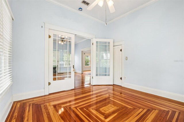 515 Frank Lloyd Wright Way, Lakeland, FL 33803 - empty room with a ceiling fan, ornamental molding, french doors, and baseboards