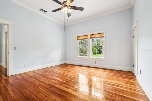 515 Frank Lloyd Wright Way, Lakeland, FL 33803 - spare room featuring wood finished floors, a ceiling fan, baseboards, and crown molding