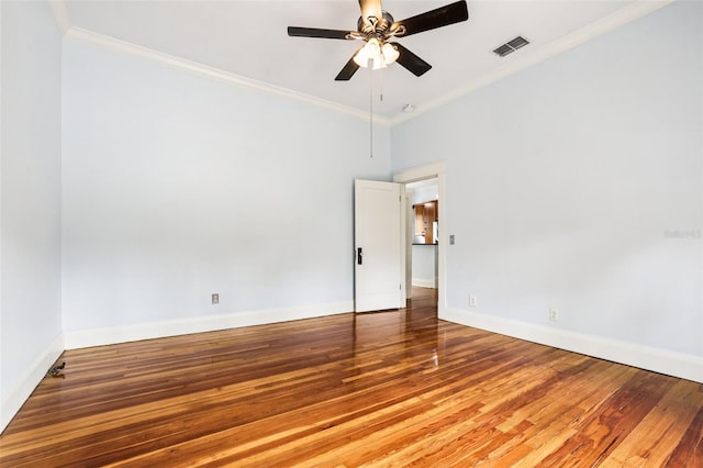 515 Frank Lloyd Wright Way, Lakeland, FL 33803 - spare room with crown molding, a ceiling fan, wood finished floors, and baseboards