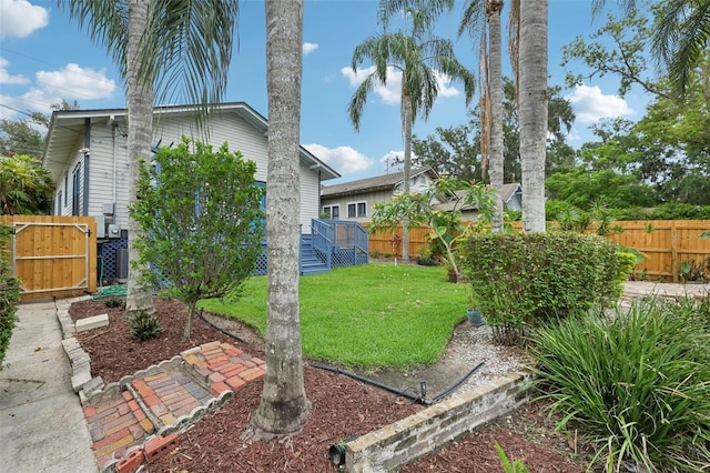 515 Frank Lloyd Wright Way, Lakeland, FL 33803 - view of yard featuring a deck and cooling unit