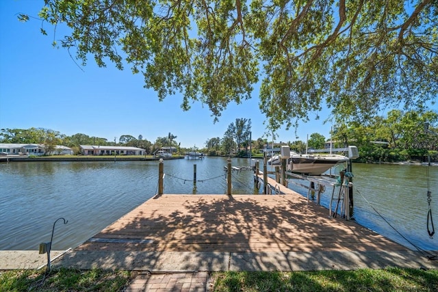 view of dock with a water view and boat lift