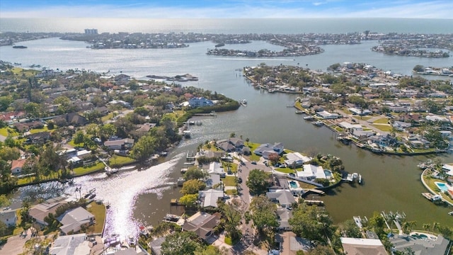 drone / aerial view featuring a water view and a residential view
