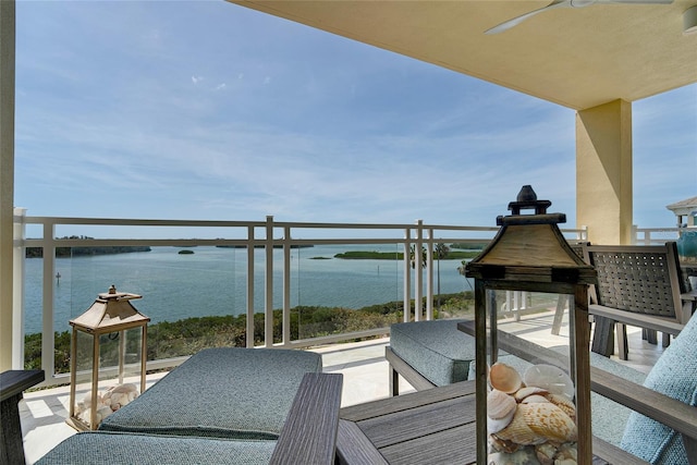 balcony featuring a water view