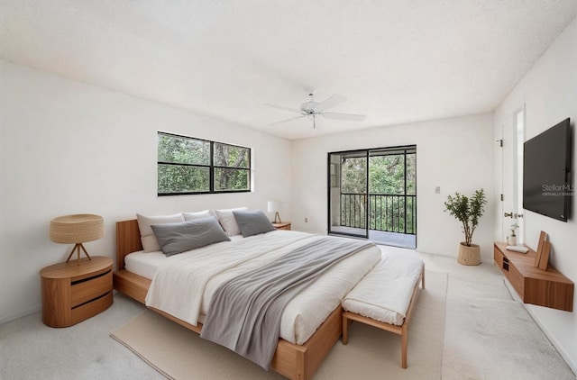 110 Hammock Pine Blvd Unit 110, Clearwater, FL 33761 - bedroom with access to exterior, carpet floors, and a ceiling fan