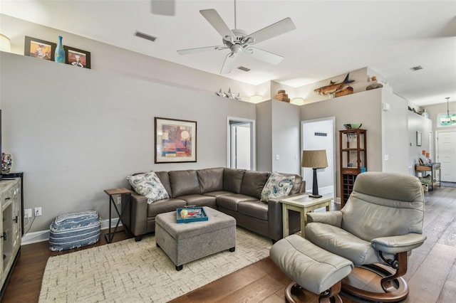 1187 Mistwood Dr, Tarpon Springs, FL 34688 - living room with visible vents, a ceiling fan, and hardwood / wood-style flooring