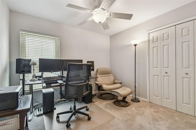 1187 Mistwood Dr, Tarpon Springs, FL 34688 - carpeted home office with baseboards and ceiling fan