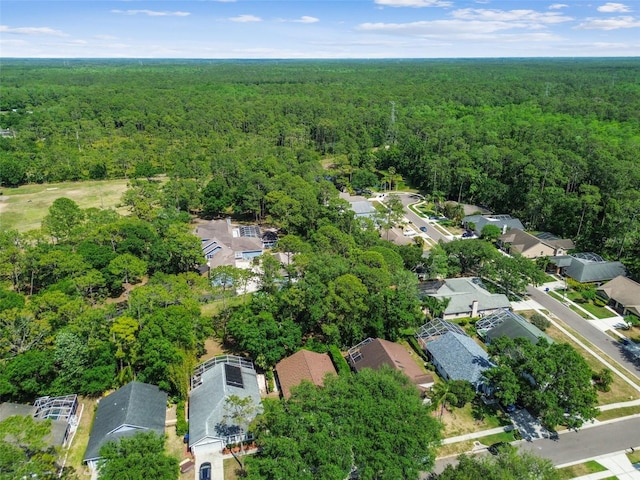1187 Mistwood Dr, Tarpon Springs, FL 34688 - bird's eye view with a view of trees and a residential view