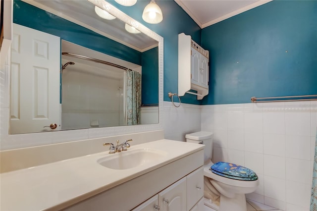 bathroom with a wainscoted wall, crown molding, toilet, vanity, and tile walls
