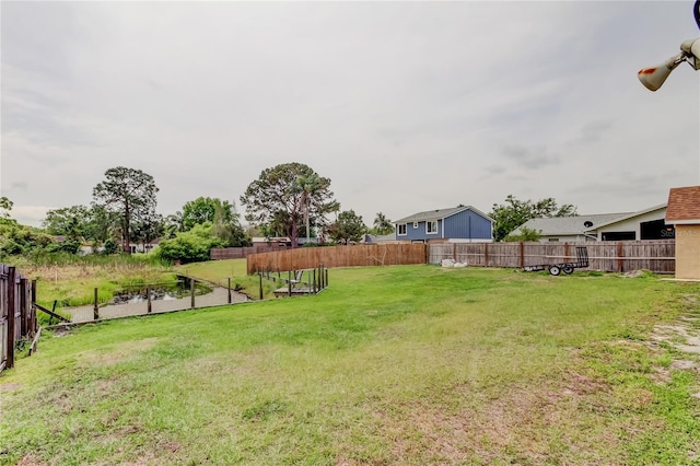 view of yard featuring fence