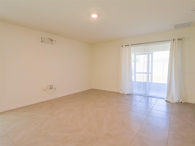 16805 Delia St, Wimauma, FL 33598 - spare room featuring recessed lighting, baseboards, visible vents, and light tile patterned floors