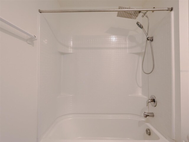 16805 Delia St, Wimauma, FL 33598 - bathroom featuring shower / washtub combination