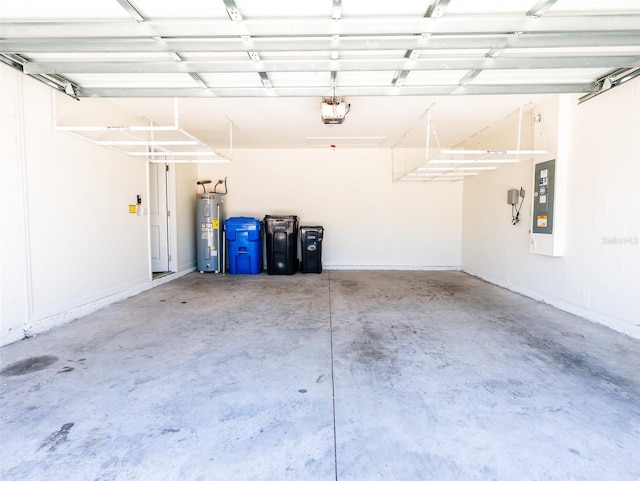 16805 Delia St, Wimauma, FL 33598 - garage with electric panel, electric water heater, and a garage door opener