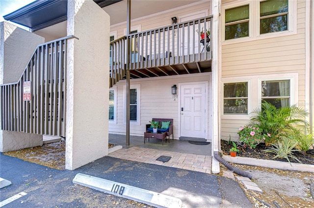 527 S Lincoln Ave Unit A108, Tampa, FL 33609 - view of exterior entry with a balcony