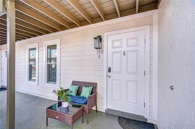 527 S Lincoln Ave Unit A108, Tampa, FL 33609 - view of exterior entry with a porch