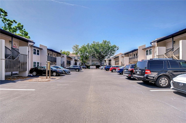 527 S Lincoln Ave Unit A108, Tampa, FL 33609 - uncovered parking lot with a residential view