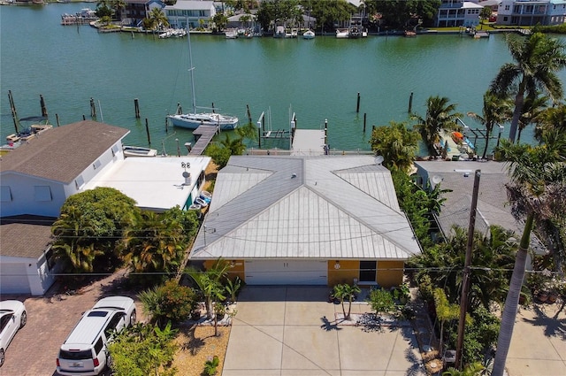 birds eye view of property featuring a water view