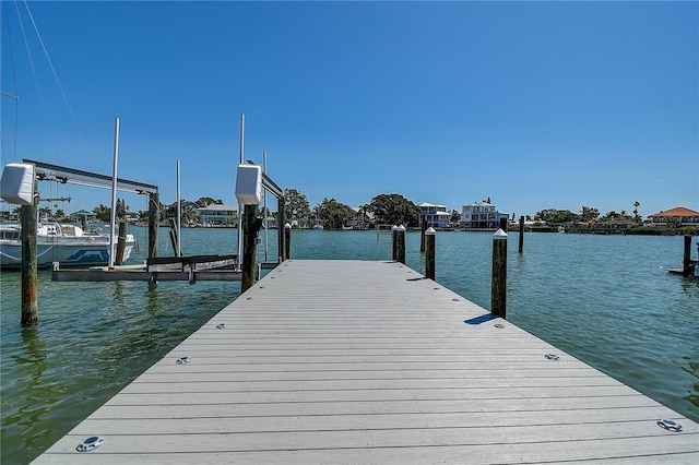dock area with a water view