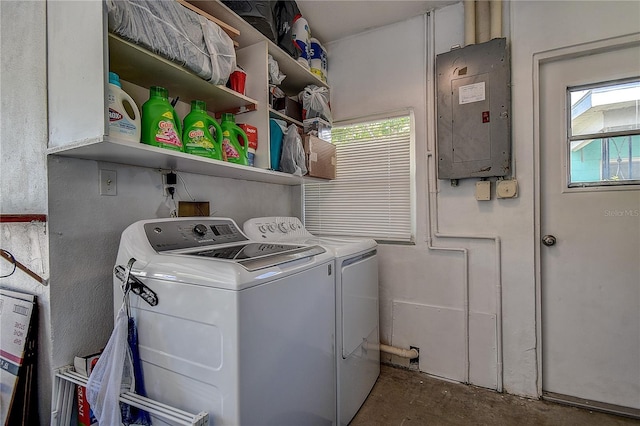 laundry area featuring washer and dryer, laundry area, and electric panel
