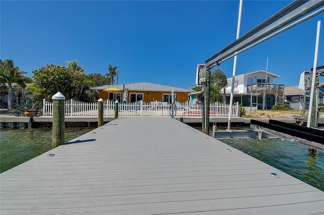 view of dock with a water view