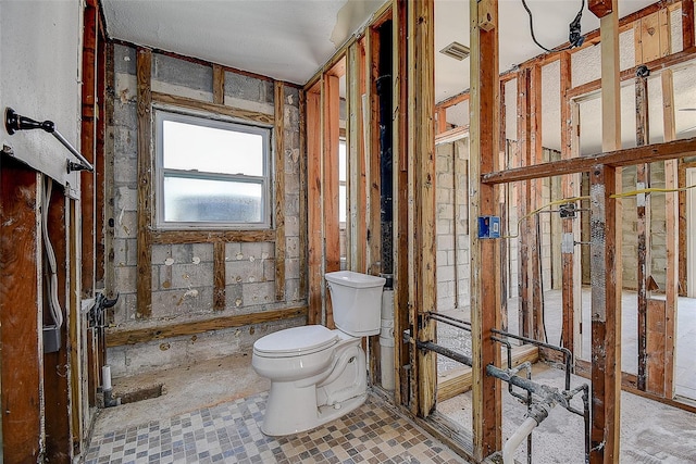 bathroom featuring toilet