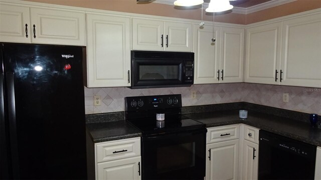 2101 Fox Chase Blvd Unit 102, Palm Harbor, FL 34683 - kitchen featuring black appliances, dark countertops, white cabinetry, and ornamental molding