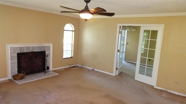 2101 Fox Chase Blvd Unit 102, Palm Harbor, FL 34683 - unfurnished living room featuring crown molding, carpet, a ceiling fan, and baseboards