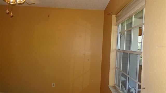 2101 Fox Chase Blvd Unit 102, Palm Harbor, FL 34683 - unfurnished room featuring a textured ceiling