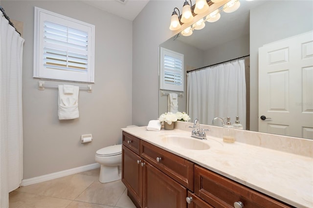 full bathroom featuring baseboards, toilet, vanity, an inviting chandelier, and tile patterned flooring