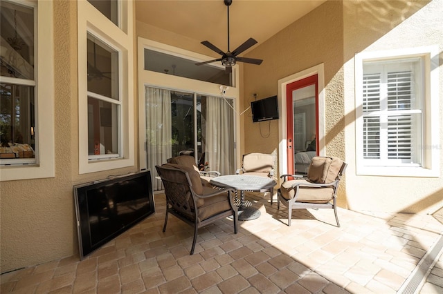 view of patio / terrace with a ceiling fan