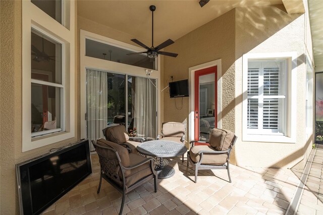 view of patio with a ceiling fan