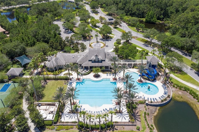 birds eye view of property with a water view