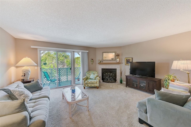 615 Garland Cir, Indian Rocks Beach, FL 33785 - carpeted living room featuring a textured ceiling and a tile fireplace